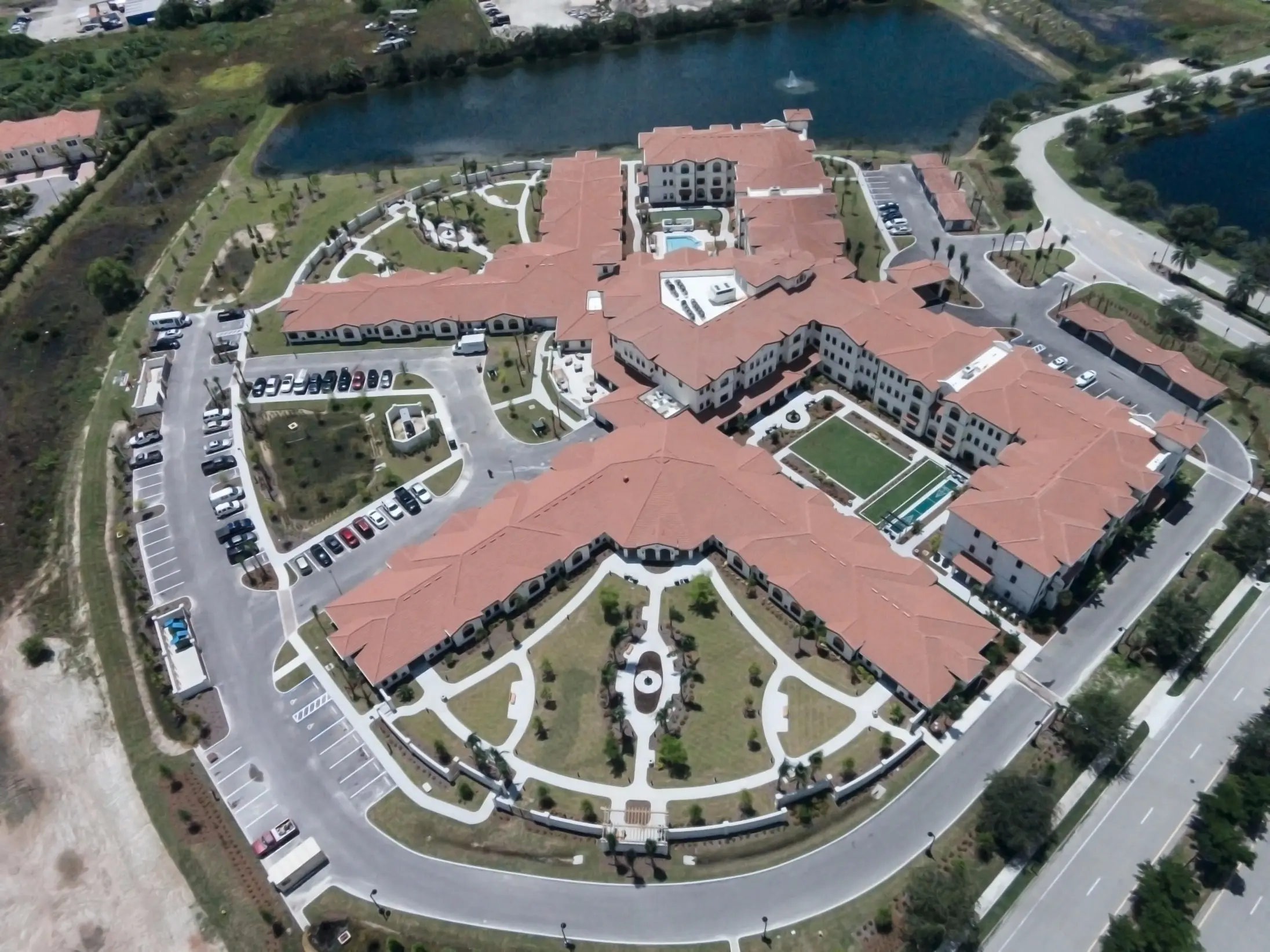 Aerial view of American House Coconut Point, a senior living community in Estero, FL