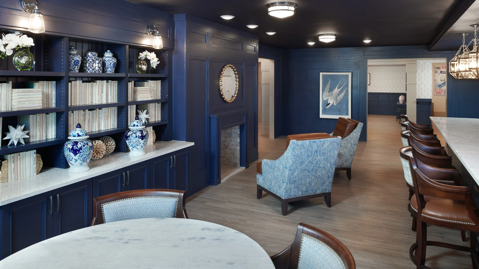 Common area with library, fireplace and bar at elder home in Bloomfield Hills, MI