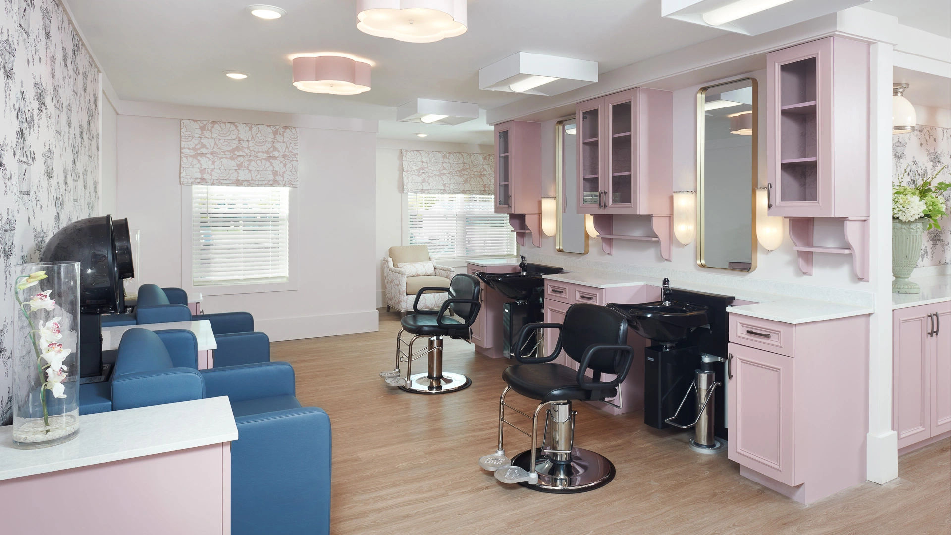 A very clean salon with pink cabinets at a retirement home in Bloomfield, MI