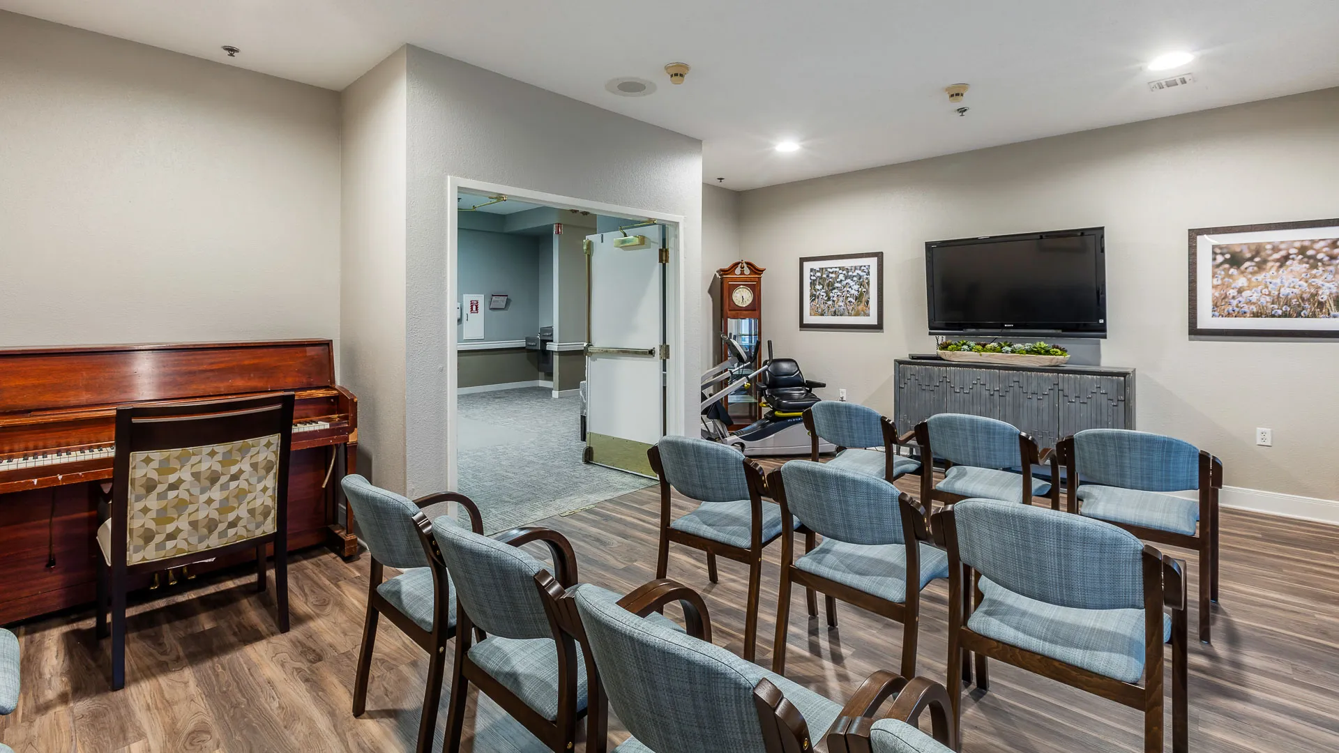 Theater and piano room at American House Bartlett