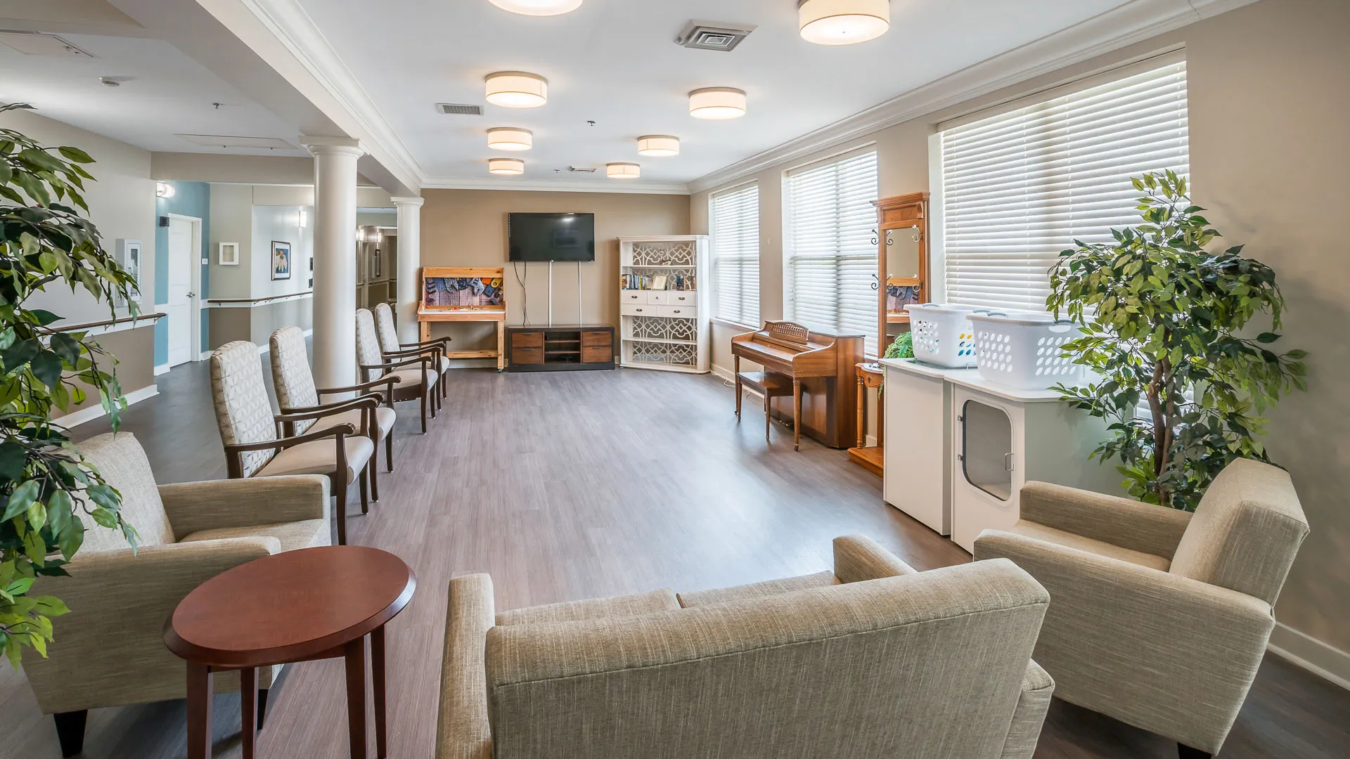 American House Bristol assisted living and memory care facility sitting room with piano