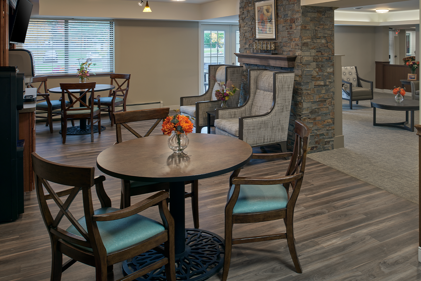 Dining bistro area of American House Grand Blanc, a senior living community.