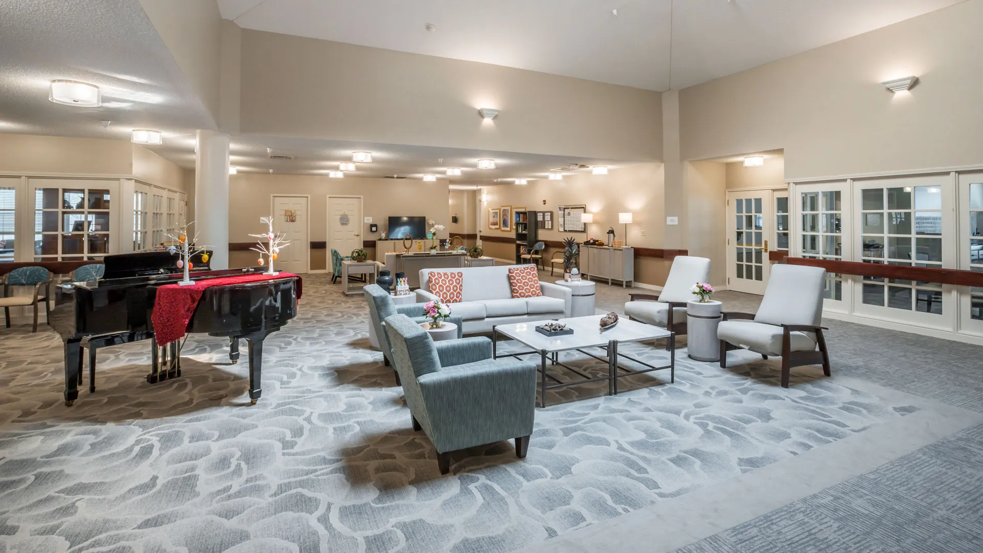 Lobby with piano at American House Johnson City Assisted Living Facility