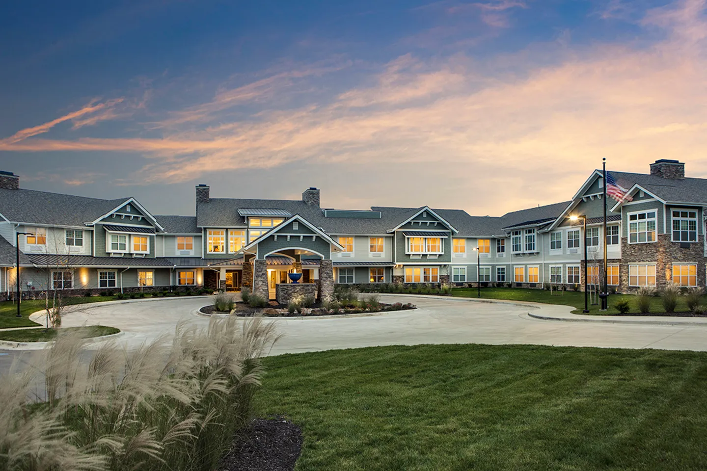 Sunset Exterior of American House Burlington Creek Assisted Living in MO