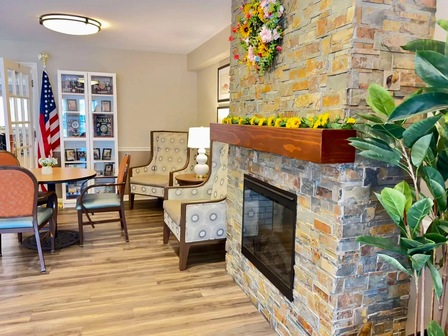 Close up of fireplace in bistro at American House senior living in westland