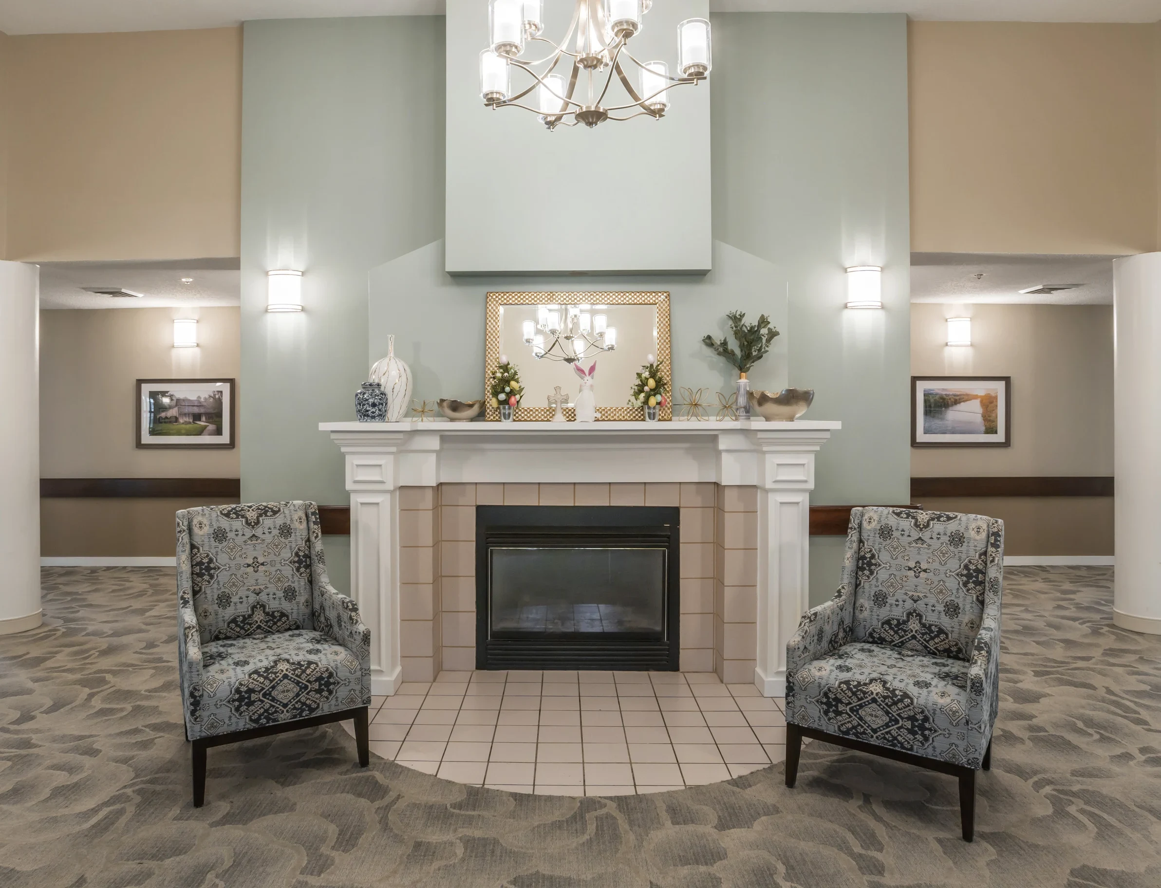 Common area with fireplace at American House Kingsport, a senior home in Kingsport TN