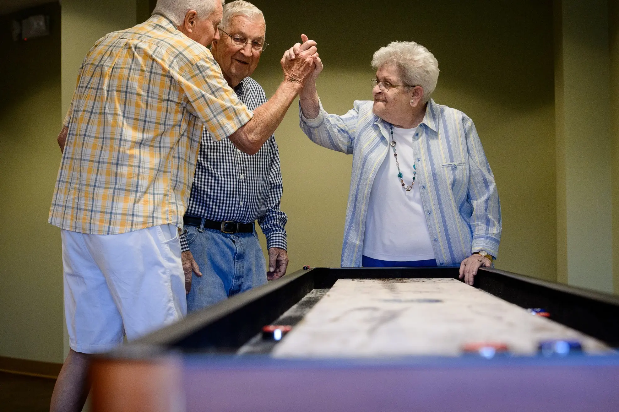 Seniors participating in the activity room of a senior living community in Niceville, FL
