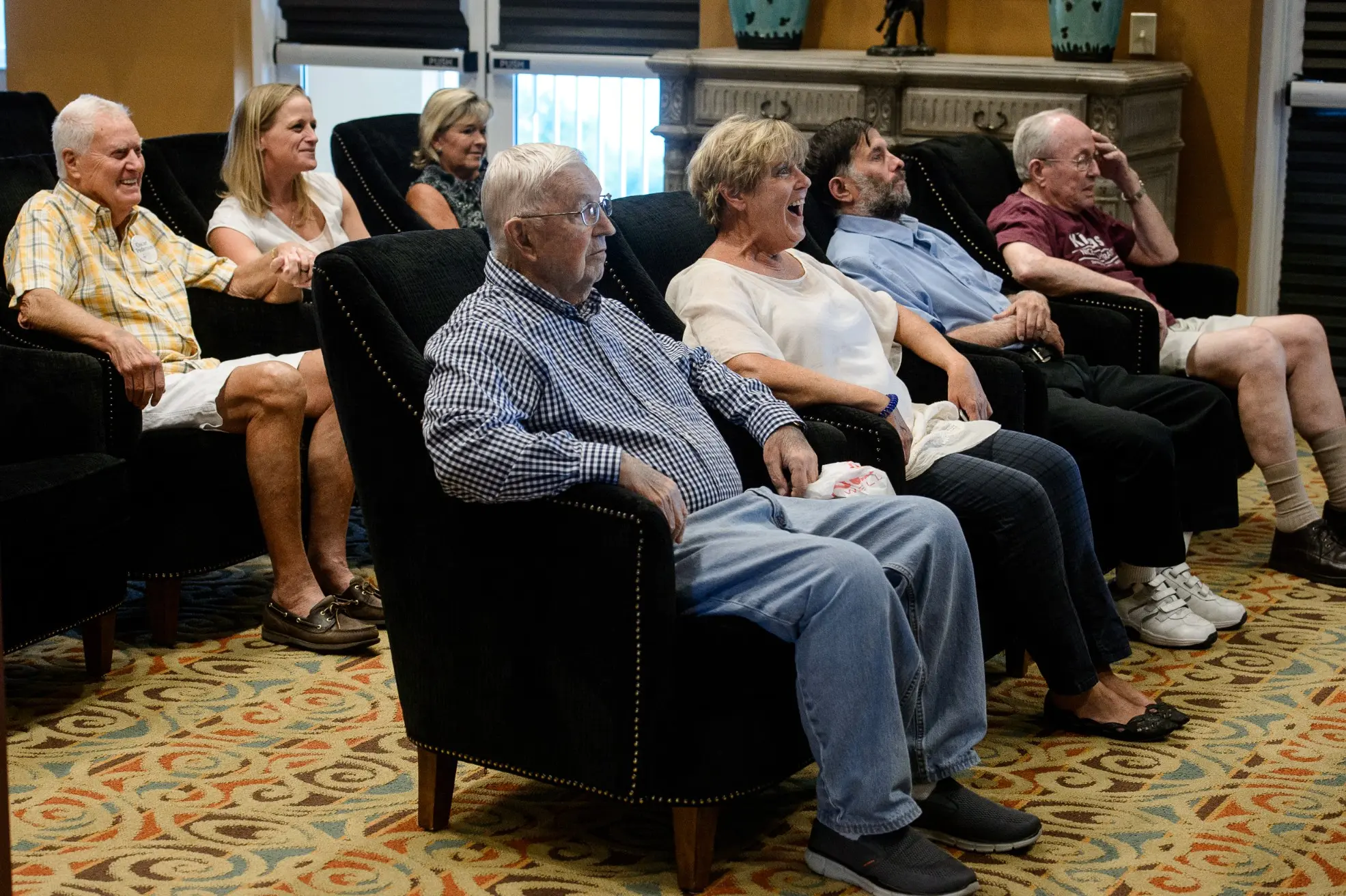 Seniors in the theatre of a senior living community in Niceville, FL