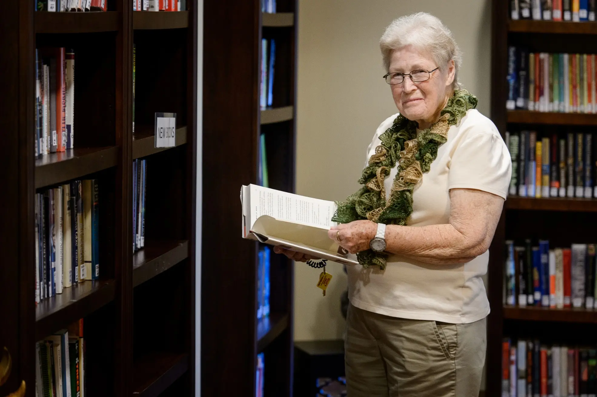 Senior in the library of a retirement community in Niceville, FL