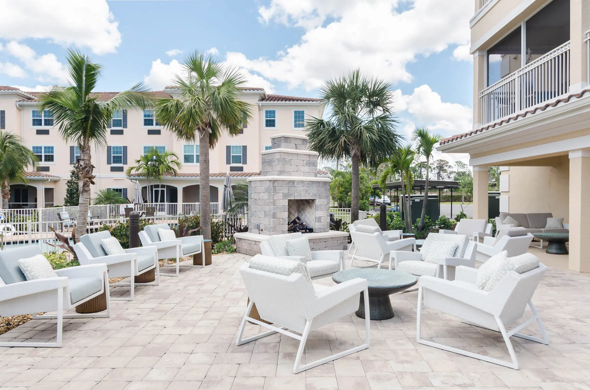 Exterior shot / patio area of American House Bonita Springs III, a senior living community in Bonita Springs, FL