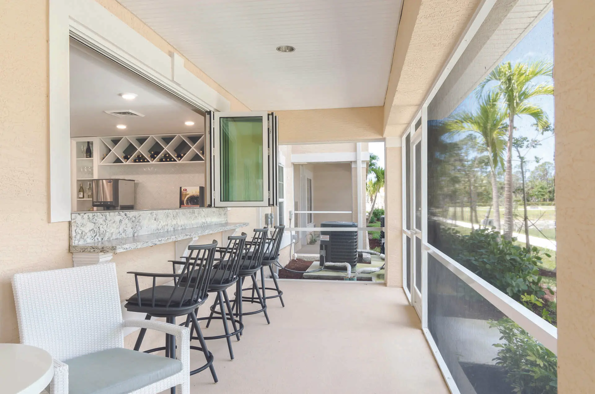 Sun room / bar area of American House Bonita Springs III, a senior living community in Bonita Springs, FL