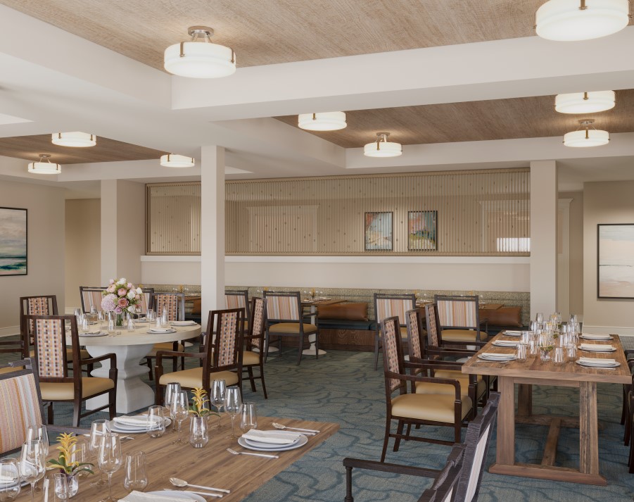 An upscale dining room with floral centerpieces at a nursing home facility in Bonita Springs, FL