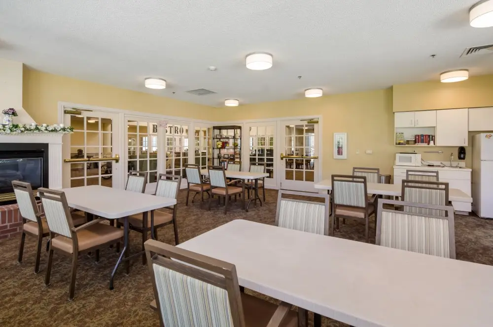 Carpeted activity room at American House Bristol, a senior living community in Bristol, Tennessee