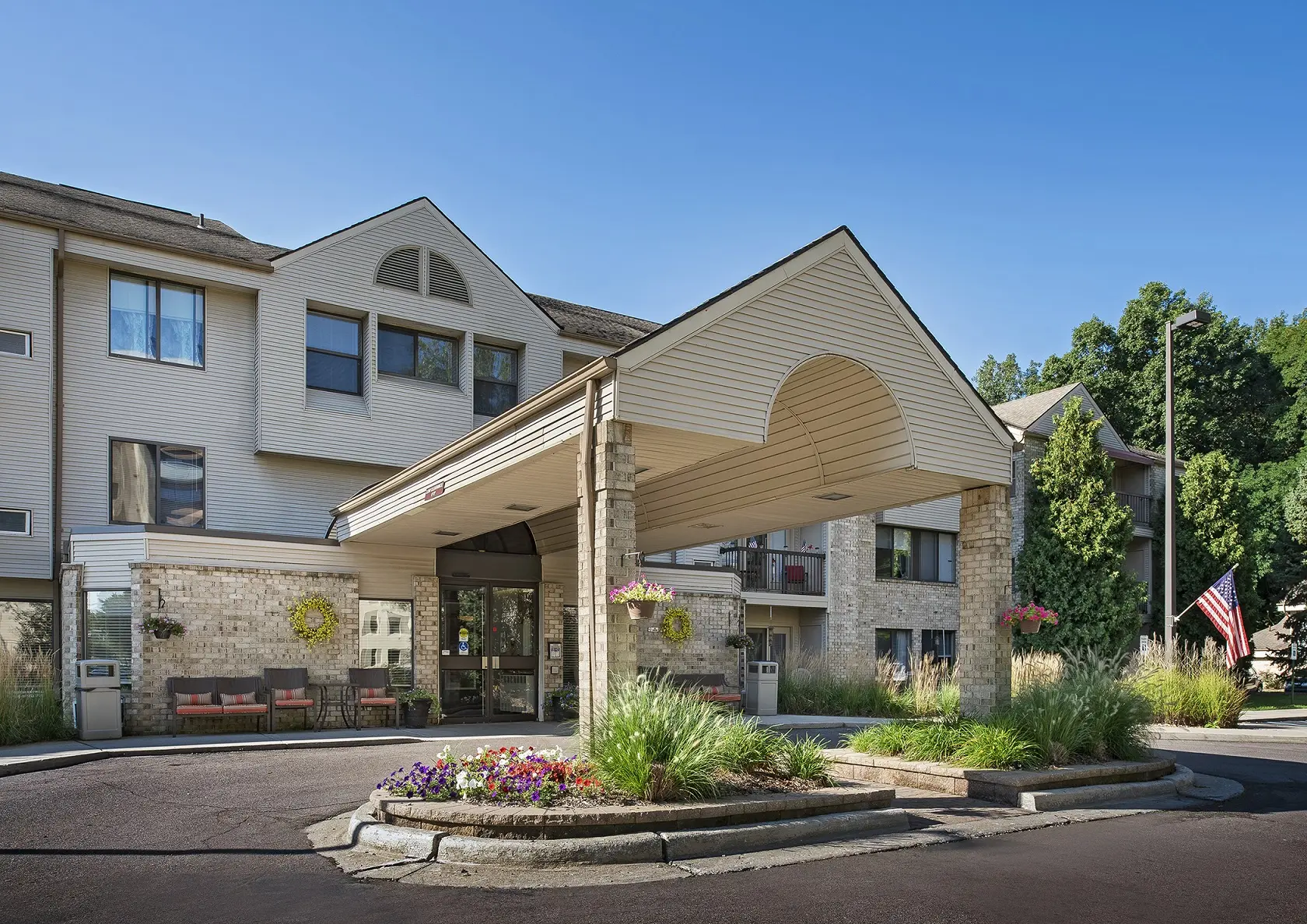 Exterior shot of American House Carpenter, a senior living community in Ypsilanti, Michigan