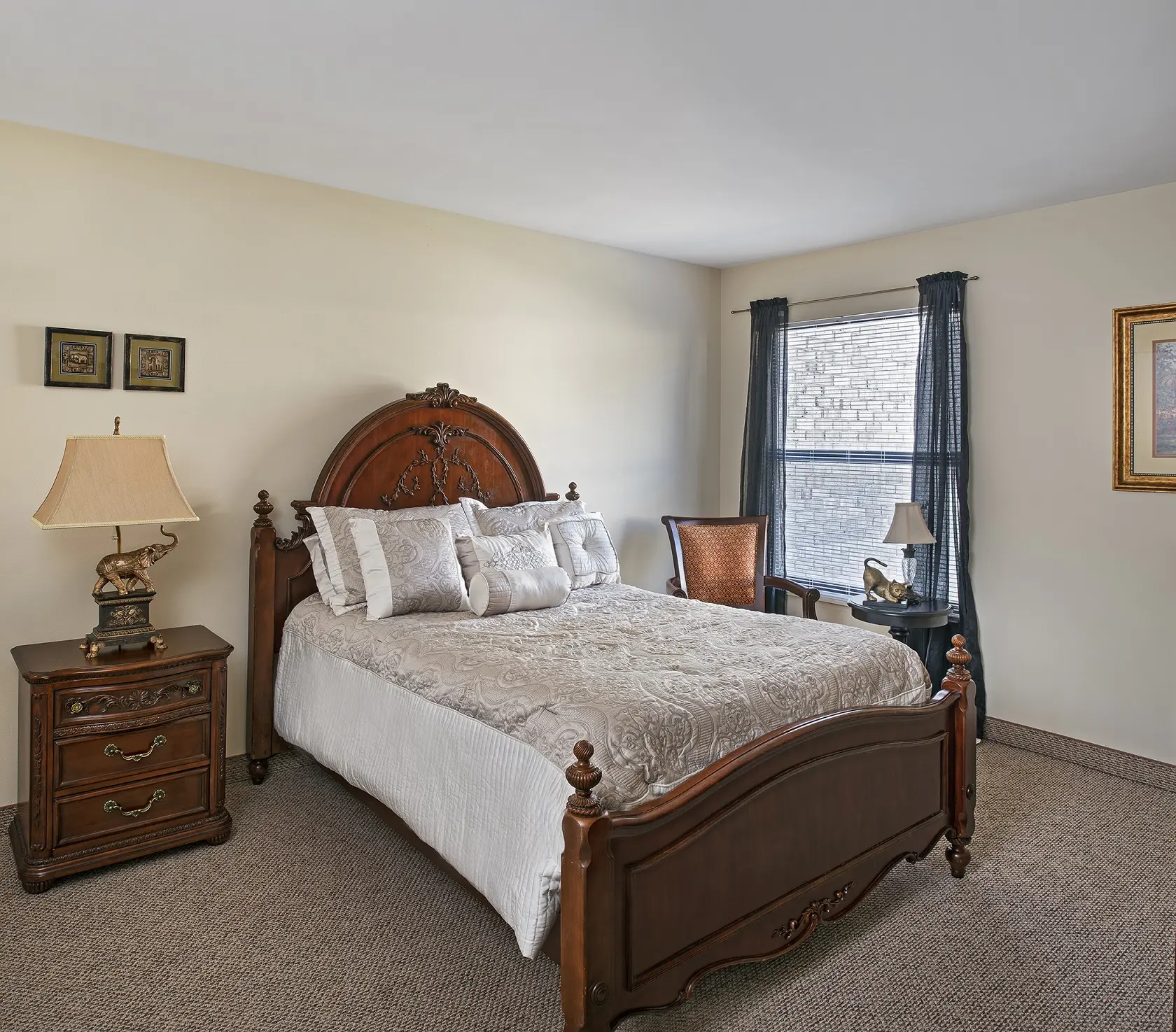 Bedroom of a senior apartment at American House Carpenter, a senior living community in Ypsilanti, Michigan