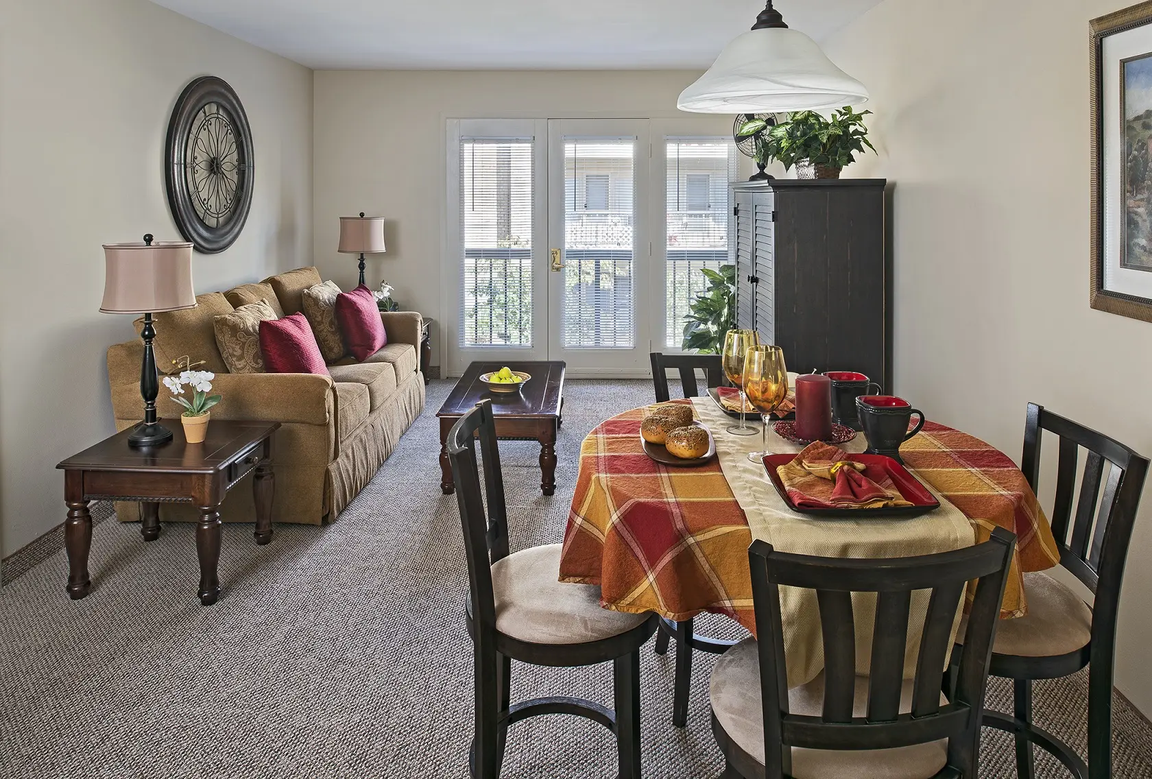 Family room and dining area of a senior apartment at American House Carpenter, a senior living community in Ypsilanti, Michigan