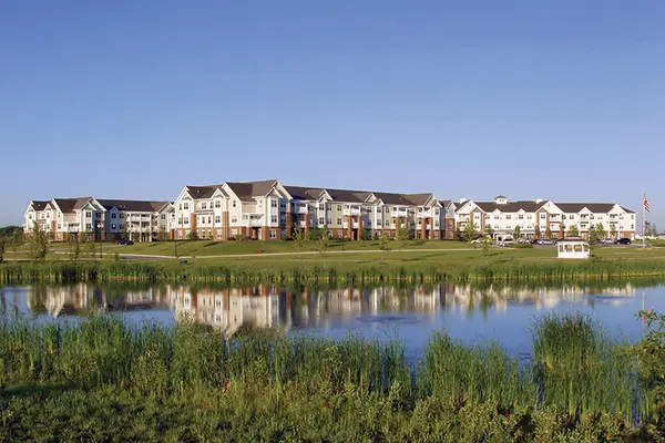 Exterior shot of American House Cedarlake, a retirement community in Plainfield, Illinois