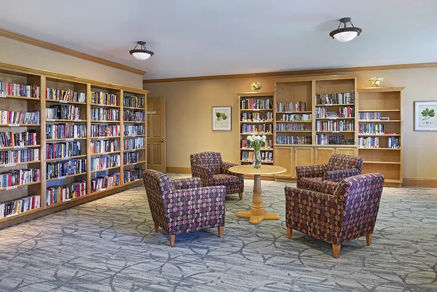 Library at American House Cedarlake, a senior living community in Plainfield, Illinois
