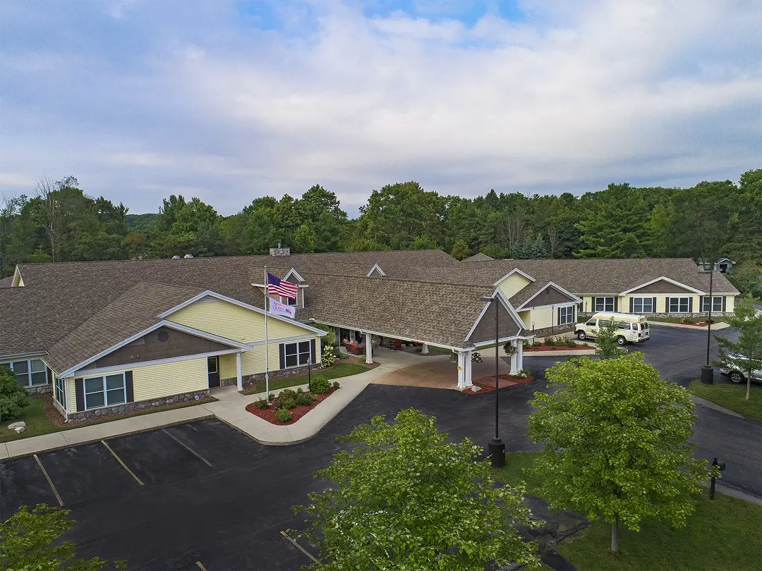 Exterior shot of American House Charlevoix, a retirement community in Charlevoix, Michigan