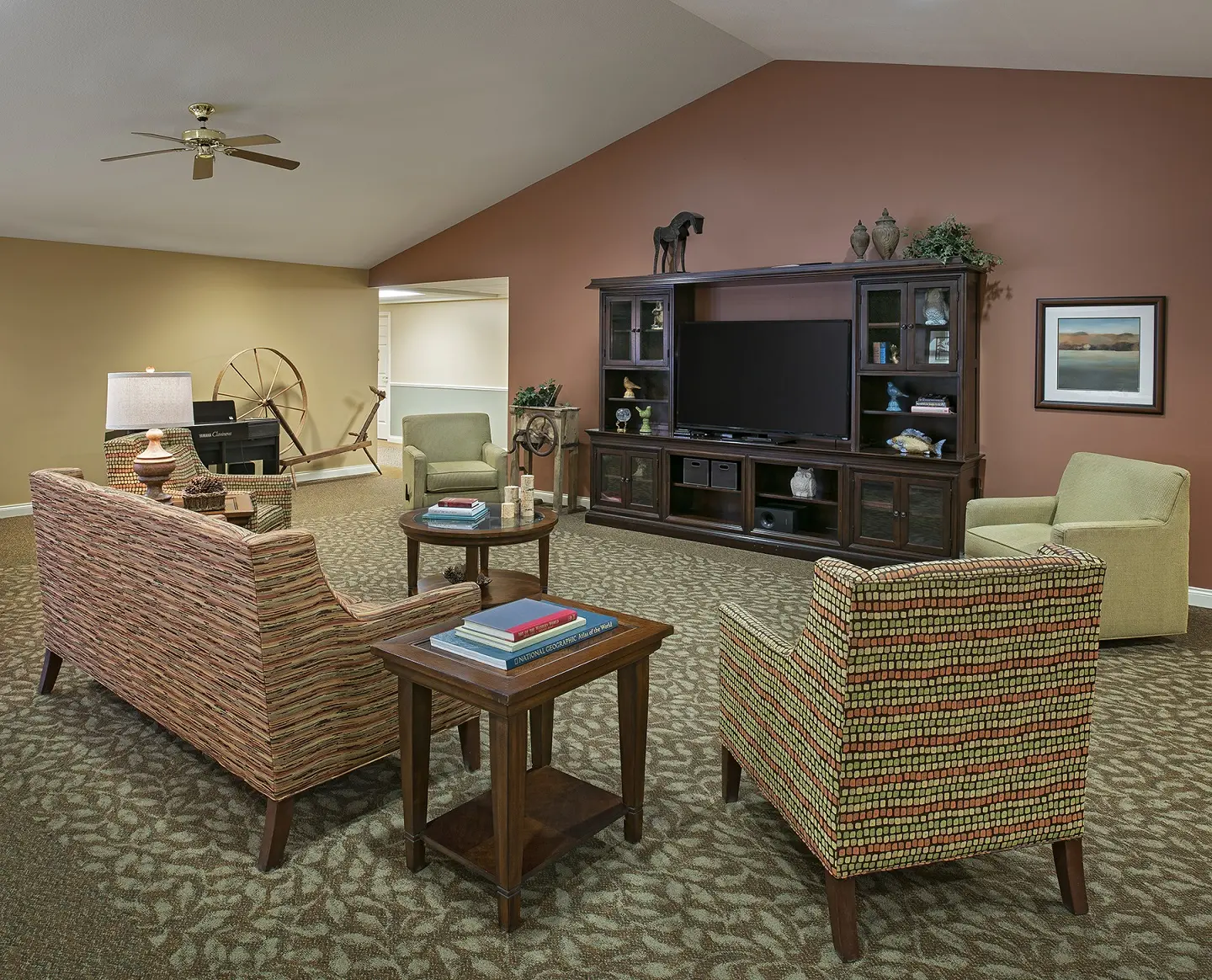 Carpeted common area of American House Charlevoix, a senior living community in Charlevoix, Michigan
