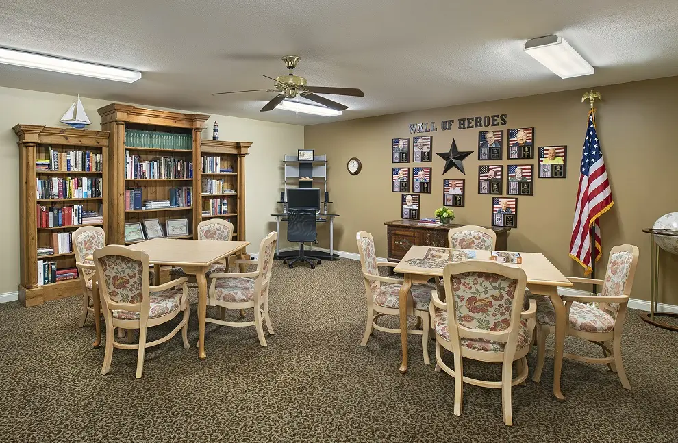 Library area of American House Charlevoix, a retirement community in Charlevoix, Michigan