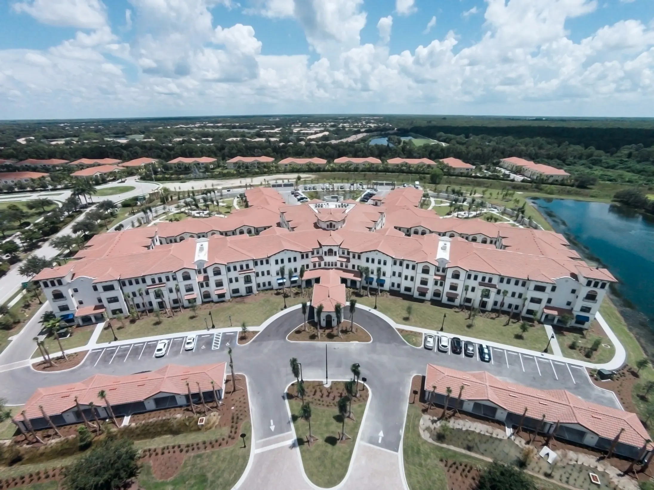 Bird's eye view of American House Coconut Point, a senior living community in Estero, FL