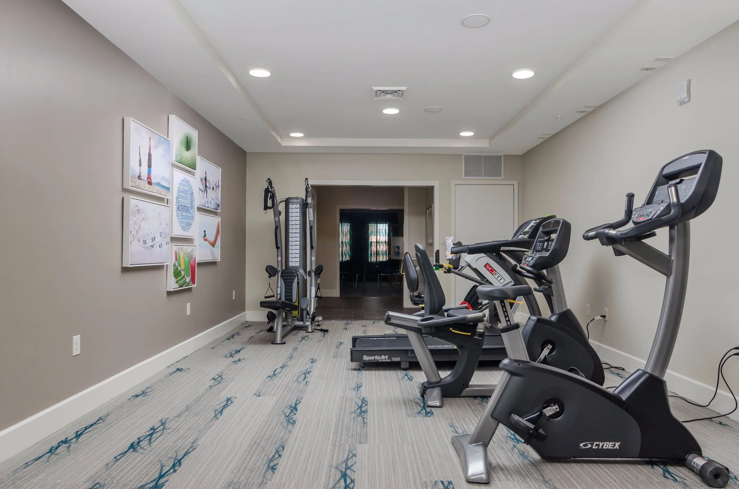 Exercise room at American House Coconut Point, a senior living community in Estero, FL