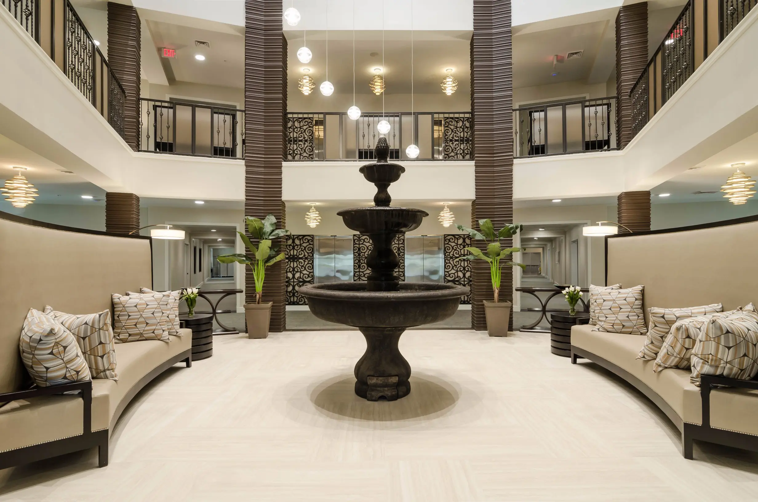 Lobby / fountain at American House Coconut Point, a senior living community in Estero, FL