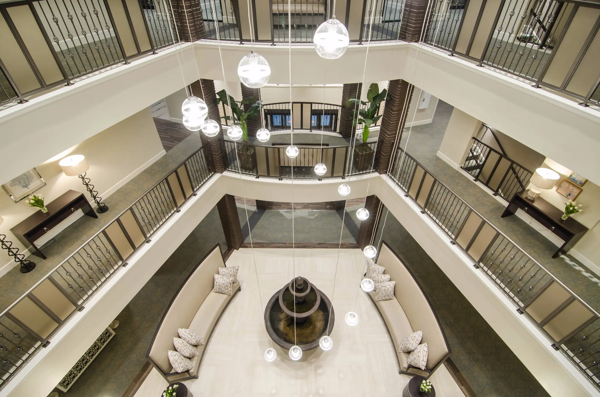 Bird's eye view of Lobby / fountain at American House Coconut Point, a senior living community in Estero, FL