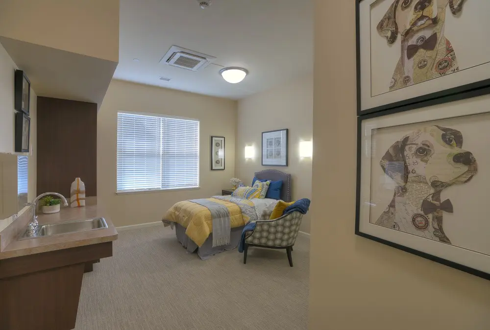 Studio bedroom of American House Freedom Place Rochester, a memory care community in Rochester, Michigan