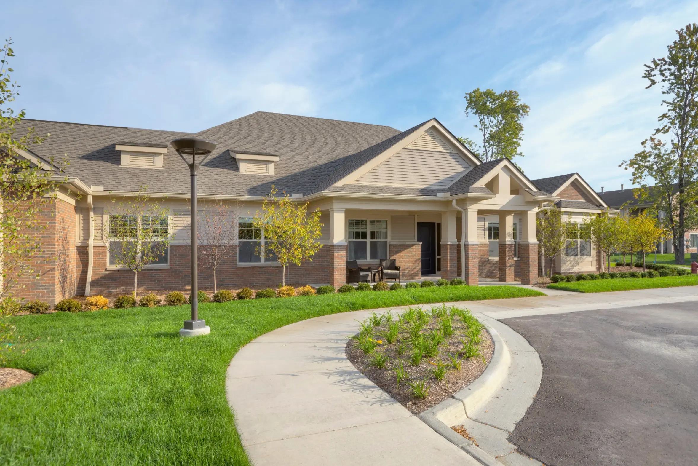 Exterior shot of American House Freedom Place Roseville, a memory care community in Roseville, Michigan