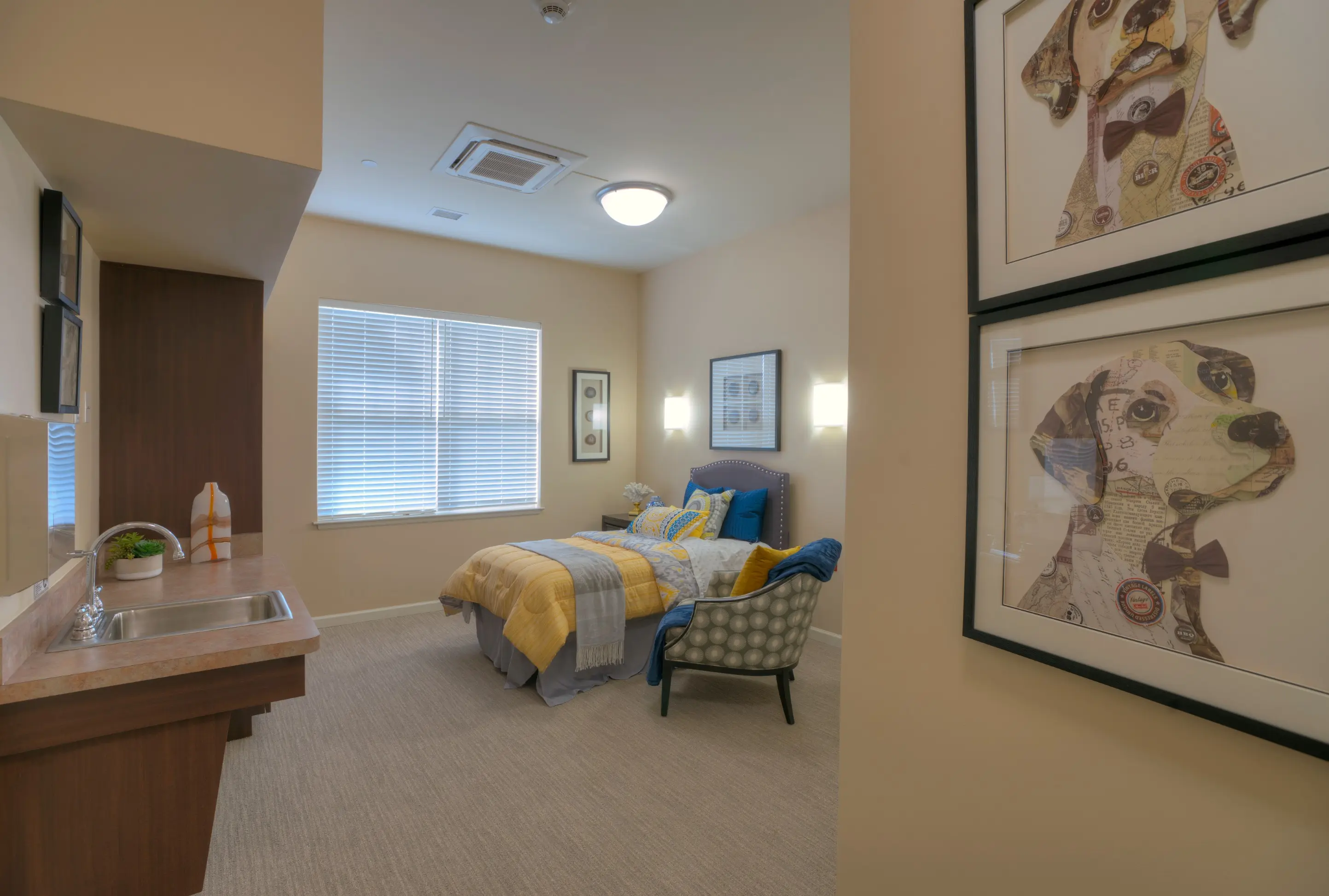 Bedroom of a senior apartment at American House Freedom Place Roseville, a memory care community in Roseville, Michigan