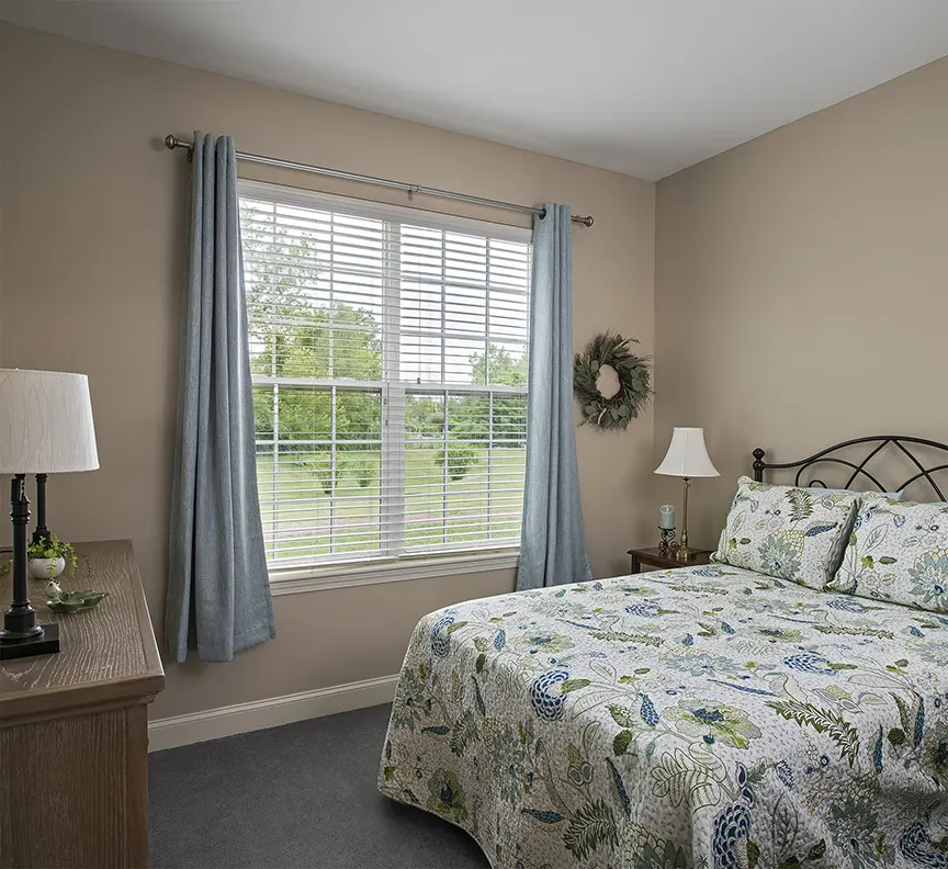 Apartment bedroom at American House Keene Retirement Community