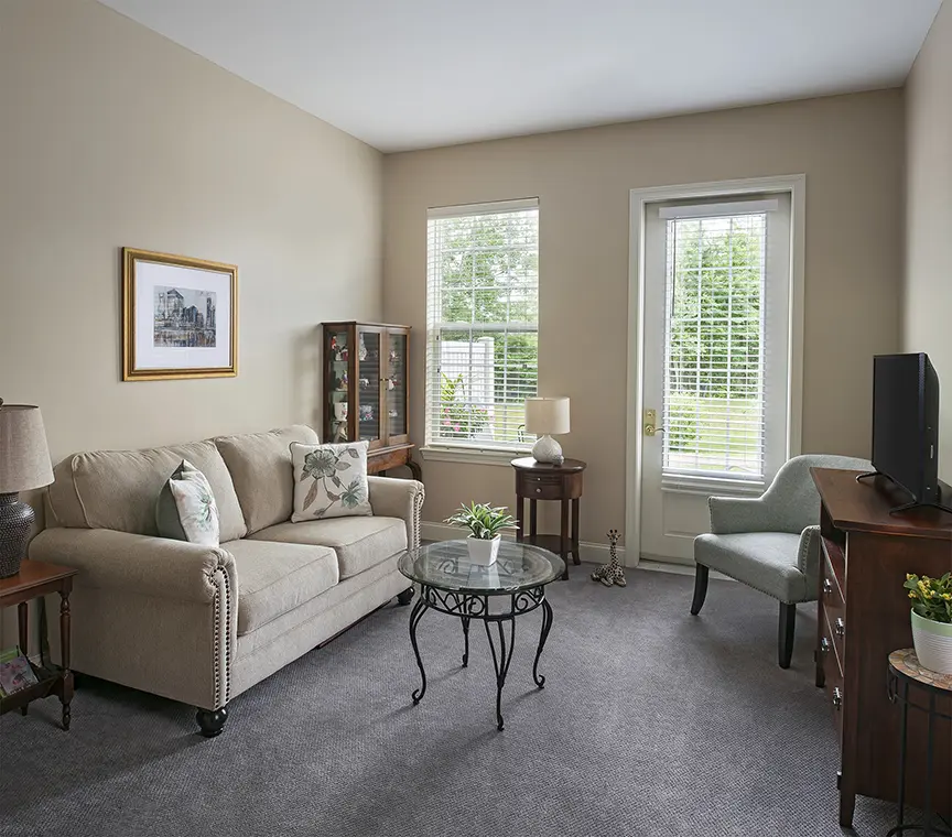 Apartment living room at American House Keene Retirement Community