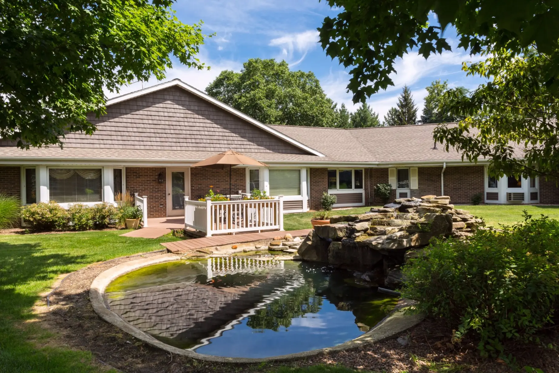 Outdoor patio/pond at American House Kentwood Senior Living Community