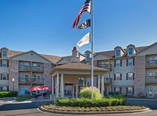 Exterior shot of American House Milford, a senior living community in Milford, Michigan