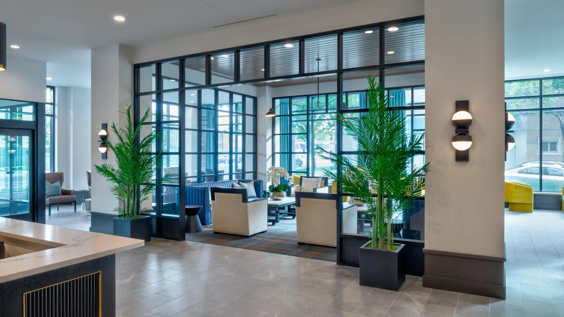 Glass lobby of American House Oak Park, a luxury senior living community in Oak Park, Illinois