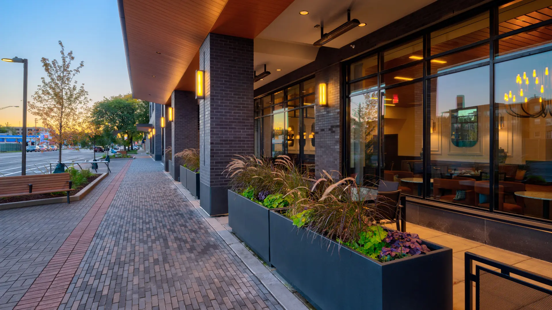 Sidewalk view of the dining room at American House Oak Park, a luxury senior living community in Oak Park, Illinois
