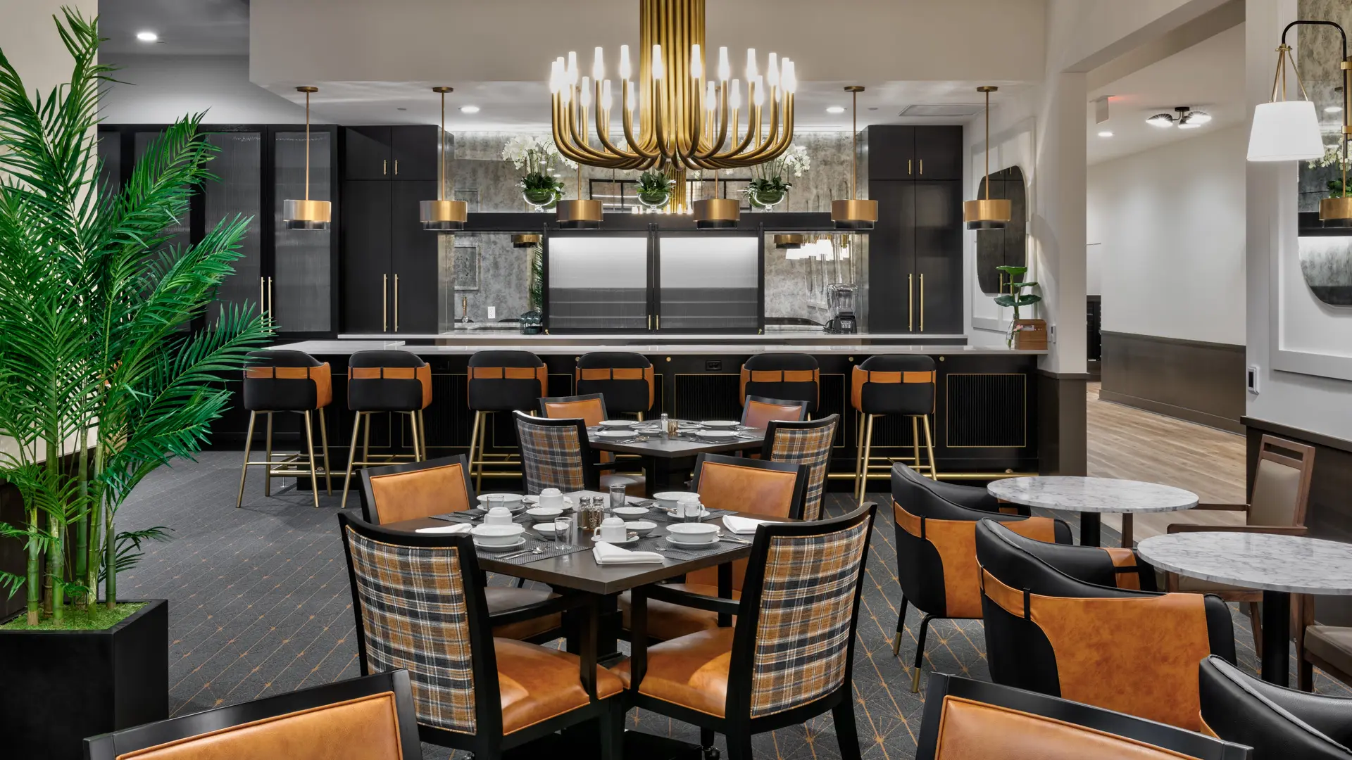 Elegant dining room at American House Oak Park, a luxury senior living community in Oak Park, Illinois