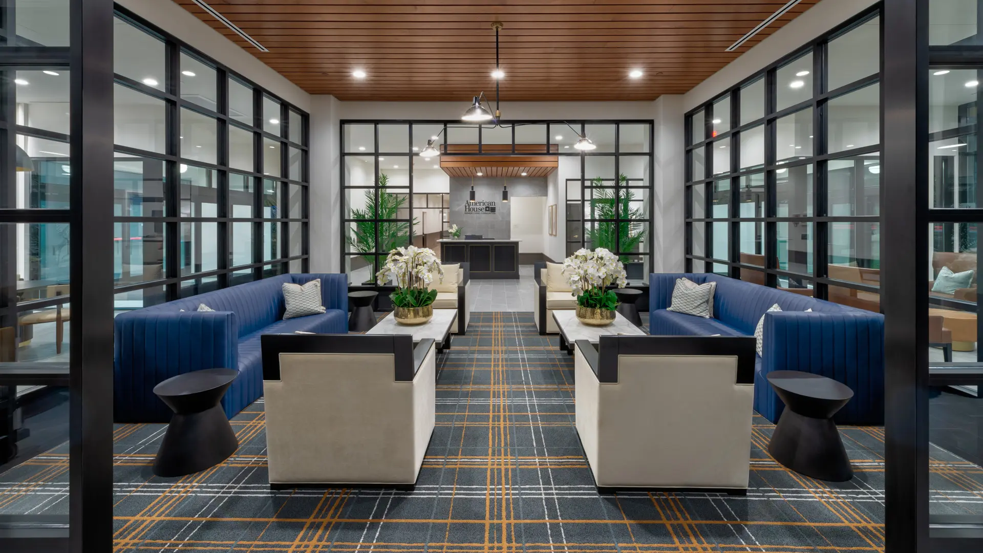 Glass lobby at American House Oak Park, a luxury retirement home in Oak Park, Illinois