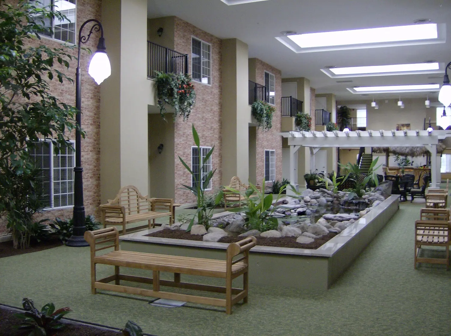 Lobby with water feature at American House Park Place, a retirement home in Macomb County, Michigan