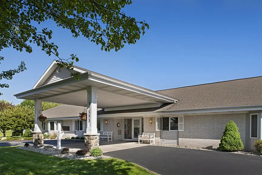 Front entrance and carport at American House elder home campus in Spring Lake, MI