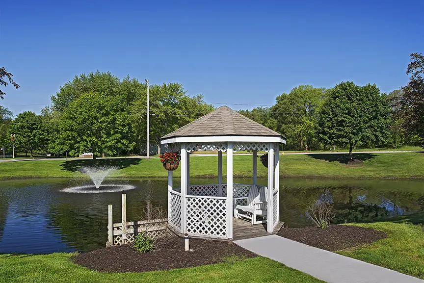 Gazebo and lake with fountain at American House retirement home Spring Lake, MI