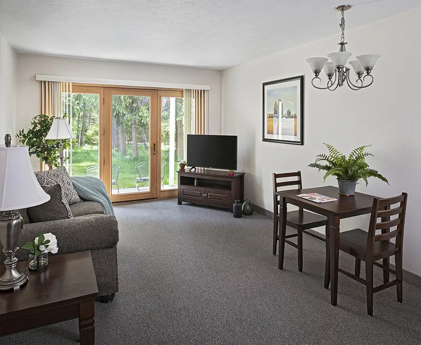 Living room in American House Senior Living apartment in Spring Lake, MI