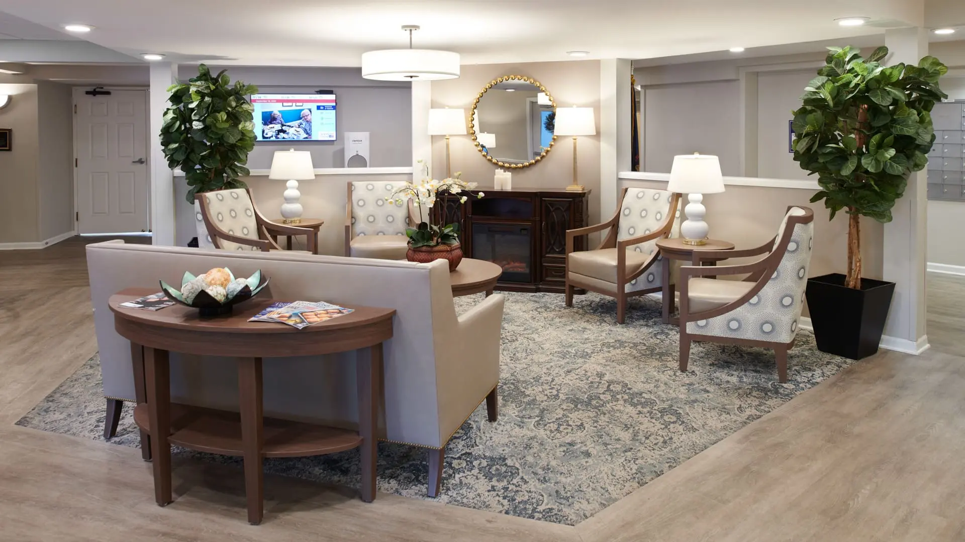 Sitting area with TV at retirement home in South Sterling Heights, Michigan