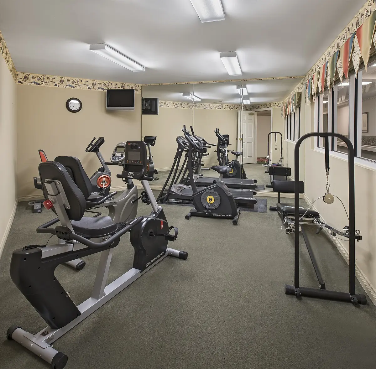 Exercise room with equipment at assisted living facility in North Sterling Heights, MI