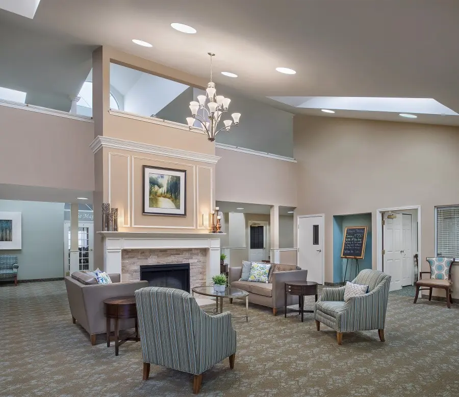 Main common area with fireplace at West Bloomfield convalescent home.